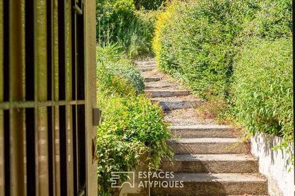 Maison avec son grand parc paysagé