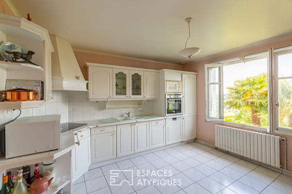 Maison avec son grand parc paysagé