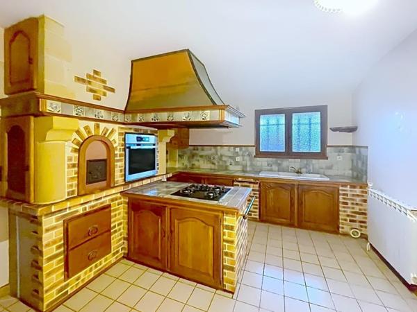 Maison située dans un secteur calme proche Bassin