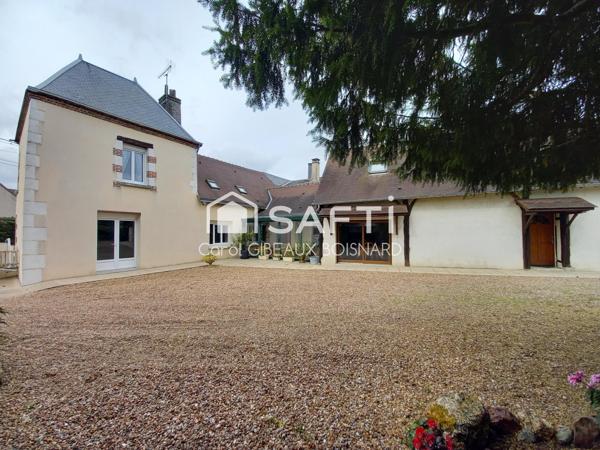 Ensemble de 2 habitations reliées avec double garage et superbe terrain