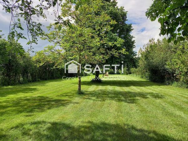 Ensemble de 2 habitations reliées avec double garage et superbe terrain