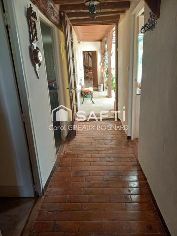 Ensemble de 2 habitations reliées avec double garage et superbe terrain