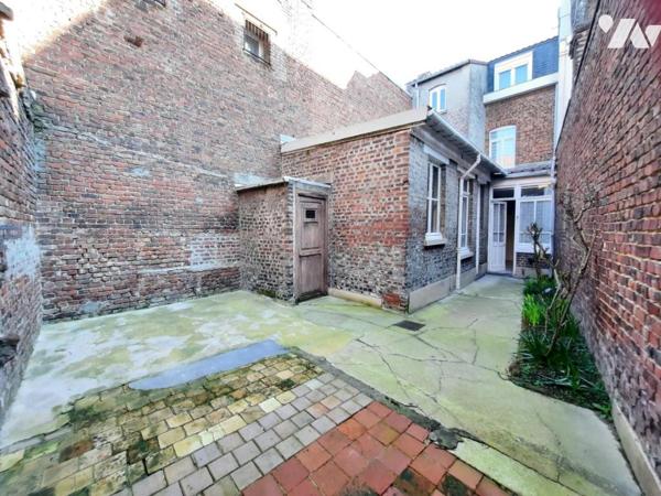 IMMEUBLE A USAGE MIXTE