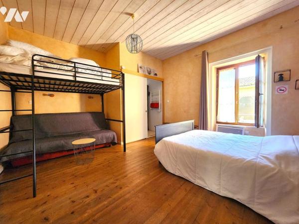 Ensemble Immobilier Atypique en Pierre à Apremont à multiples revenus