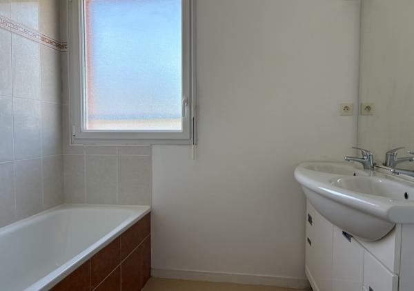 Appartement T4 de 83 m² avec balcon, garage double et cave