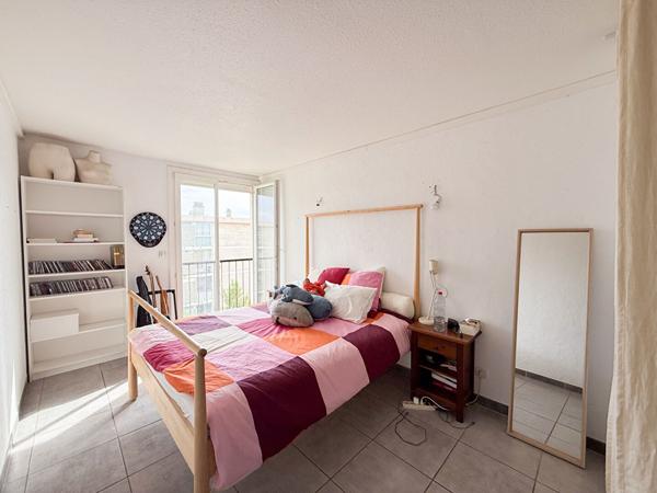 Marignane - À vendre : Appartement T3/4 à Marignane avec une cave et une place de stationnement