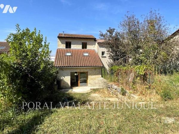 Maison avec jardin en plein centre-ville