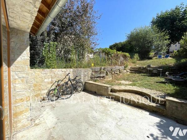 Maison avec jardin en plein centre-ville