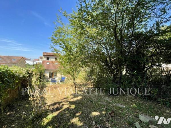 Maison avec jardin en plein centre-ville