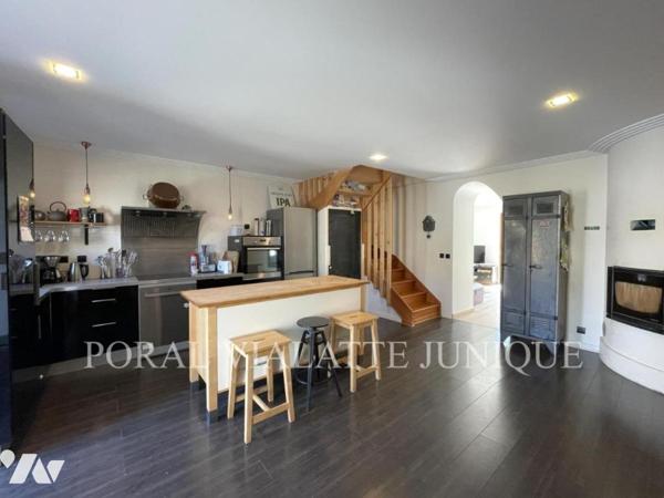 Maison avec jardin en plein centre-ville