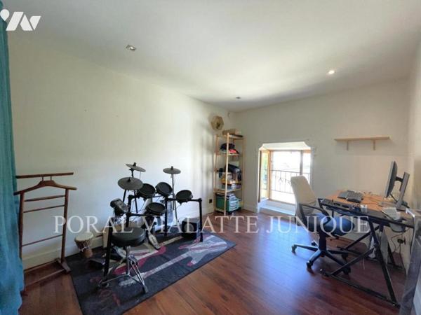 Maison avec jardin en plein centre-ville