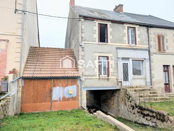 Maison de village, 4 chambres, terrain, garage.
