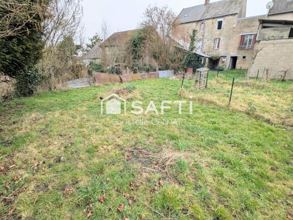 Maison de village, 4 chambres, terrain, garage.