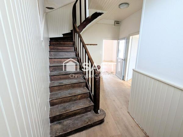 Maison de village, 4 chambres, terrain, garage.