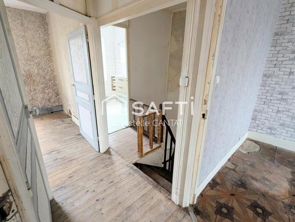 Maison de village, 4 chambres, terrain, garage.