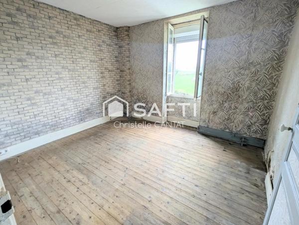 Maison de village, 4 chambres, terrain, garage.