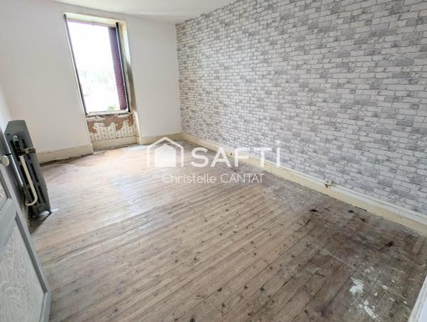 Maison de village, 4 chambres, terrain, garage.