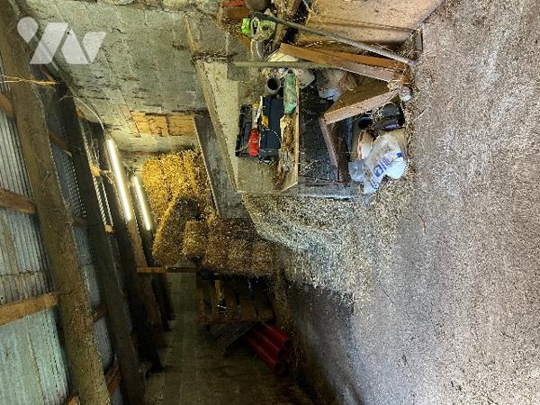 Sur les hauteurs de CAMPAN, une grange et hangar de 100 m² sur terrain de 553 m² avec vues montagnes