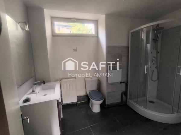 Immeuble de rapport avec extérieur, garage, ateliers, jardin, caves