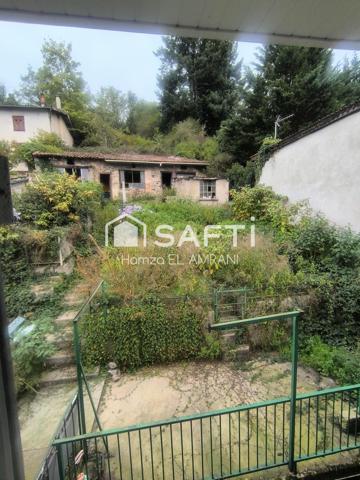 Immeuble de rapport avec extérieur, garage, ateliers, jardin, caves