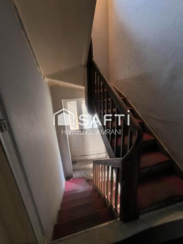 Immeuble de rapport avec extérieur, garage, ateliers, jardin, caves