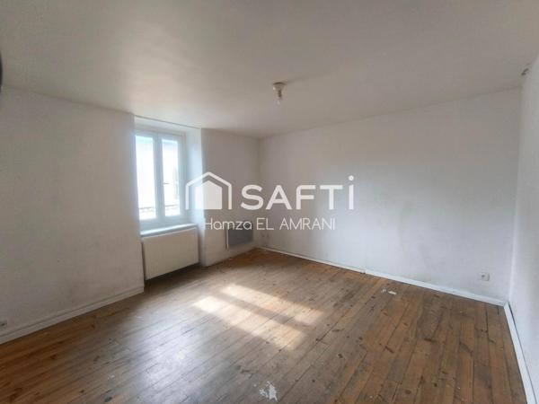 Immeuble de rapport avec extérieur, garage, ateliers, jardin, caves