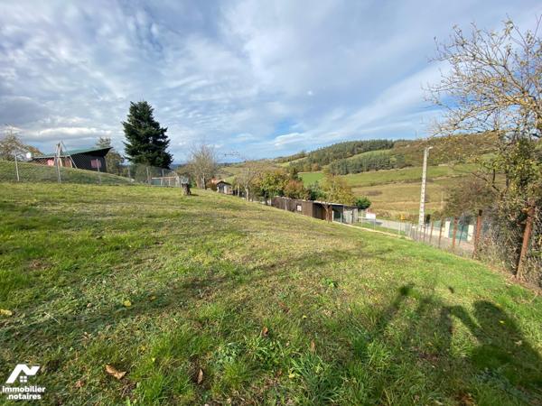 Terrain pentu de 1500m² exposé Sud-ouest avec vue