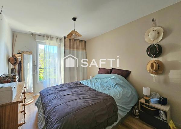 Appartement 3 pièces dans une résidence de standing avec jardin.