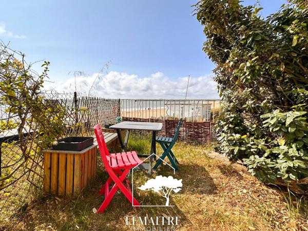 T2 pied dans le sable