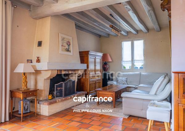 Propriété pleine de charme avec deux chambres de plain-pied et un sous-sol total !