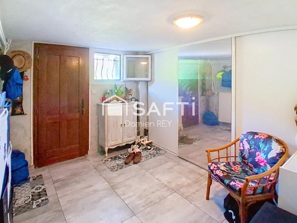 Maison de ville d'environ 101m² avec terrasse, jardin en balcons, et garage double en enfilade