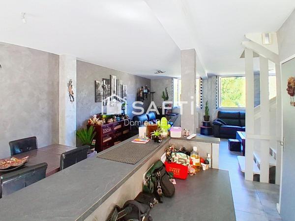 Maison de ville d'environ 101m² avec terrasse, jardin en balcons, et garage double en enfilade