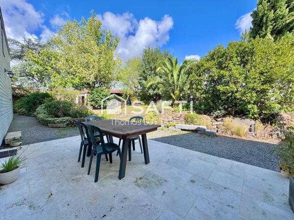 Belle maison, jardin paysagé, garage et dépendance.