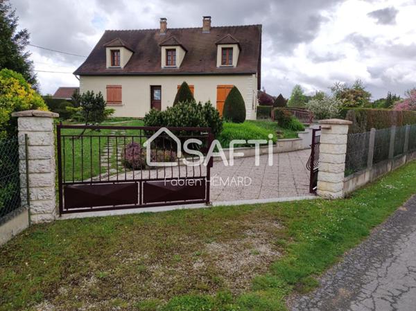 belle maison traditionnelle sur terrain paysager de 1682 m2.
