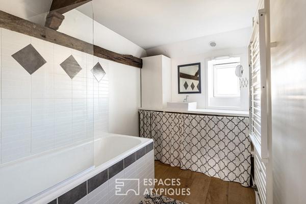 Duplex urbain boisé avec vue privée et garage