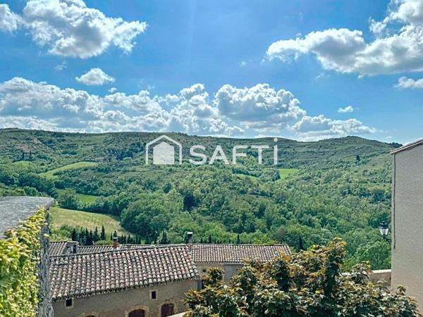 MAISON DE VILLAGE  A RENOVER AVEC UN SOUS SOL ET UN  PETIT EXTERIEUR