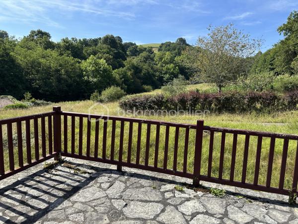 Nîchée dans un environnement calme et verdoyant , cette superbe propriété au charme basque offre un immense potentiel. 
idéale pour une grande famille, un projet de chambres d'hôtes ou un gîte touristique, elle bénéficie d'une vue imprenable sur la campagne environnante et d'une situation privilégiée.
La maison est actuellement divisée en deux espaces distincts, chacun avec son entrée indépendante.
Pour le 1er espace vous disposerez au rez de chaussée d'une grande pièce de vie, cuisine, une  chambre, salle de bains et wc indépendant.
L'étage dessert 3 chambres spacieuses
Un garage attenant complète ce bien.
Le deuxième espace dispose d'un vaste séjour avec cheminée donnant accès direct à la piscine,cuisine, une autre grande pièce à aménager au grè de vos envies,une chambre, une salle d'eau et WC indépendant.
A l'étage vous bénéficierez de 5 chambres supplémentaires , un dressing ,salle de bains et WC.
La parcelle de 5000 m2 est entièrement arboré et fleuri , offrant de beaux espaces de détente autour de la piscine et un cadre de vie paisible.
Travaux à prévoir mais un potentiel exceptionnel pour qui saura le sublimer .