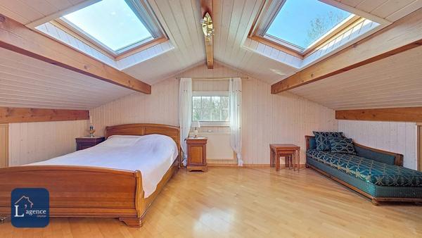 Maison Individuelle T7 de 240m2 avec piscine, terrasse, garage double, atelier indépendant, quartier calme proche centre-ville