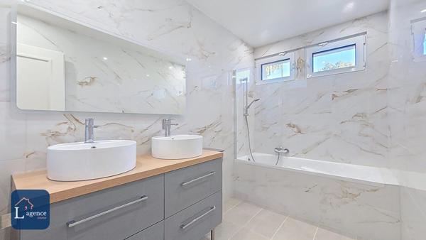 Maison Individuelle T7 de 240m2 avec piscine, terrasse, garage double, atelier indépendant, quartier calme proche centre-ville