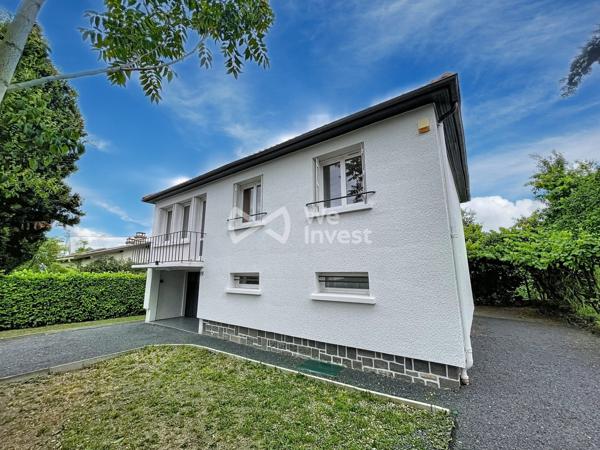 Villa traditionnelle rénovée avec jardin.