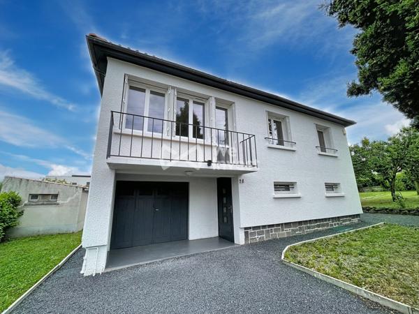 Villa traditionnelle rénovée avec jardin.