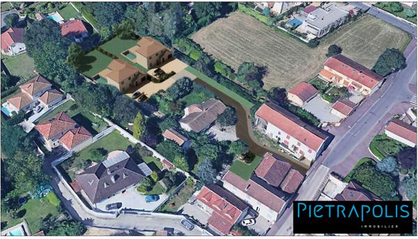 Magnifique Terrain plat de 821m2 viabilisé au centre de Genas !