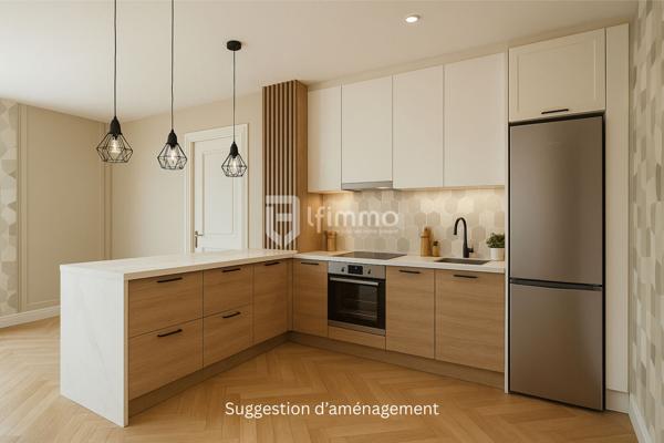 Sous compromis : Rez de jardin rénové dans une maison de Maître