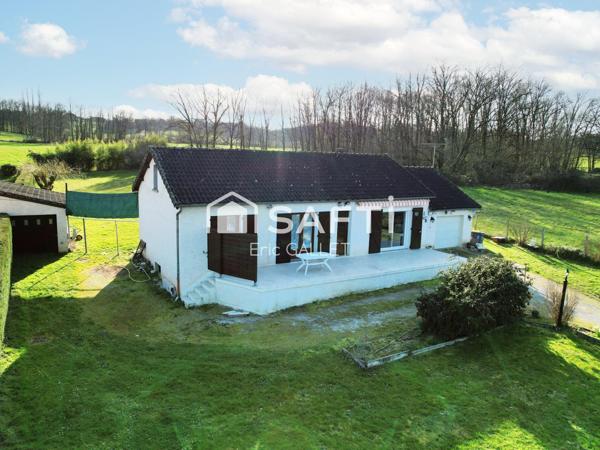 Maison de plain-pied 5 pièces avec jardin.