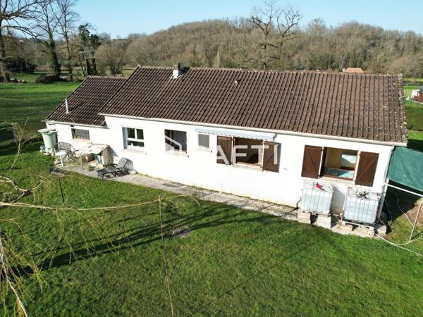 Maison de plain-pied 5 pièces avec jardin.