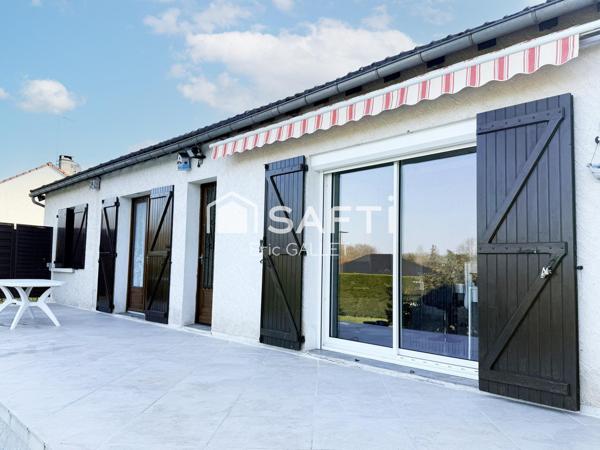 Maison de plain-pied 5 pièces avec jardin.