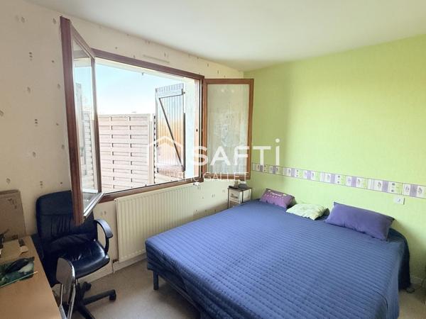 Maison de plain-pied 5 pièces avec jardin.