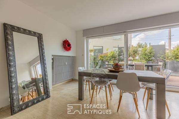 Appartement lumineux aux extérieurs élégamment aménagés