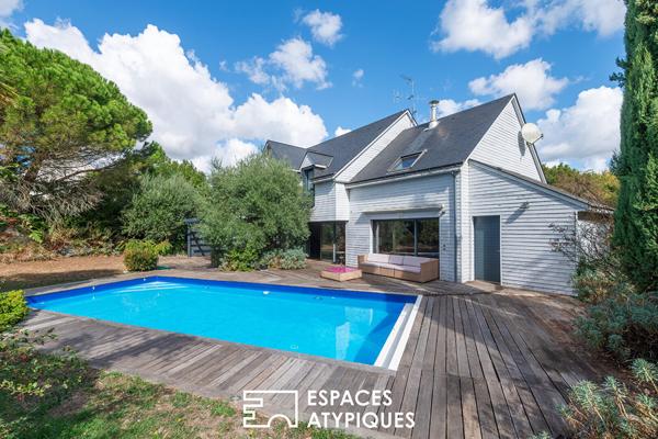 Maison d’architecte au cadre privilégié