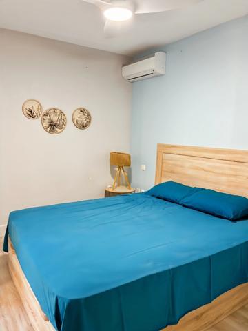 Saint-Gilles les Bains – T2 raffiné aux prestations soignées, varangue, jardin privatif et garage box